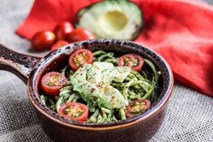 Courgetti with pesto and balsamic tomatoes